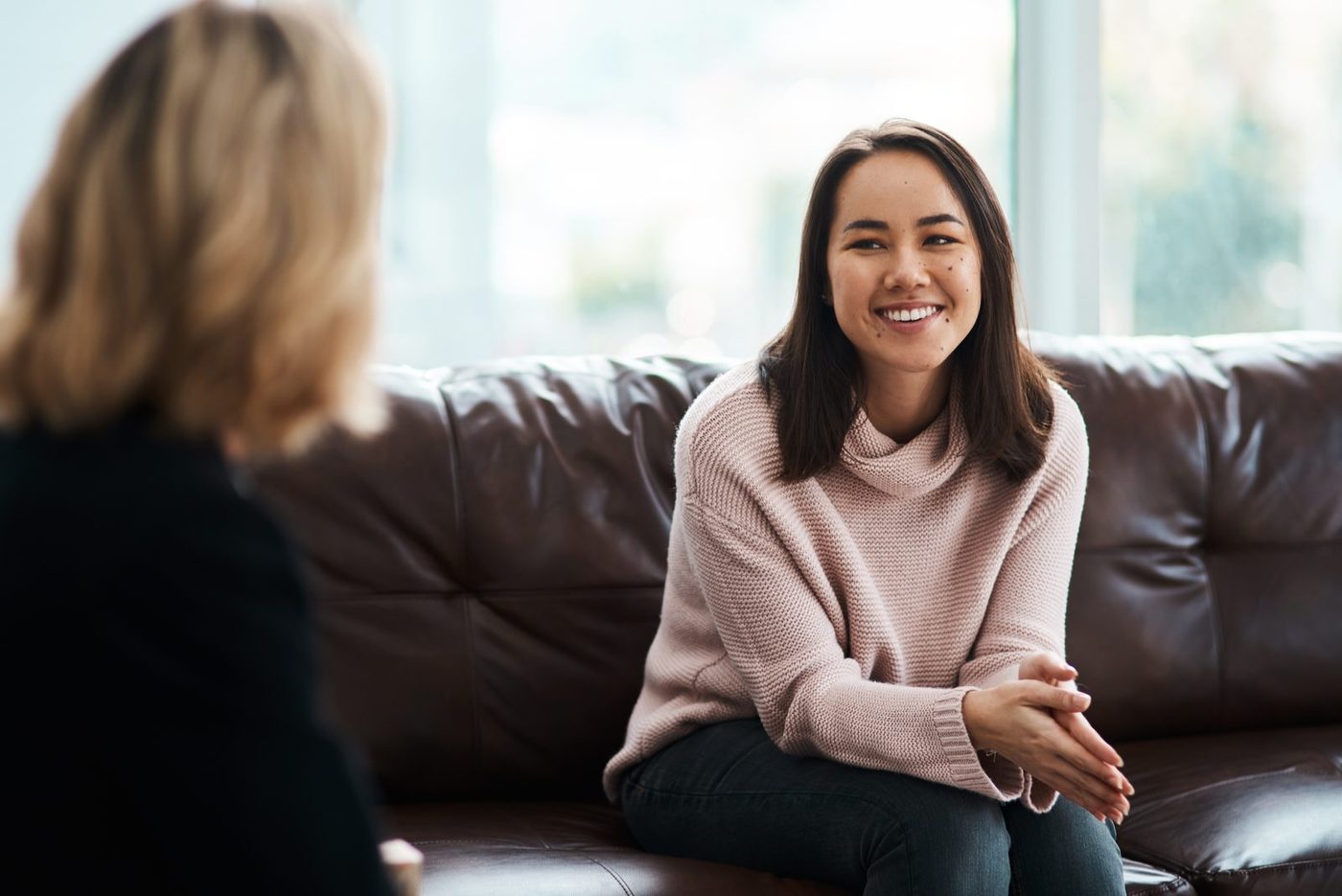 A warm, supportive one-on-one conversation between two people